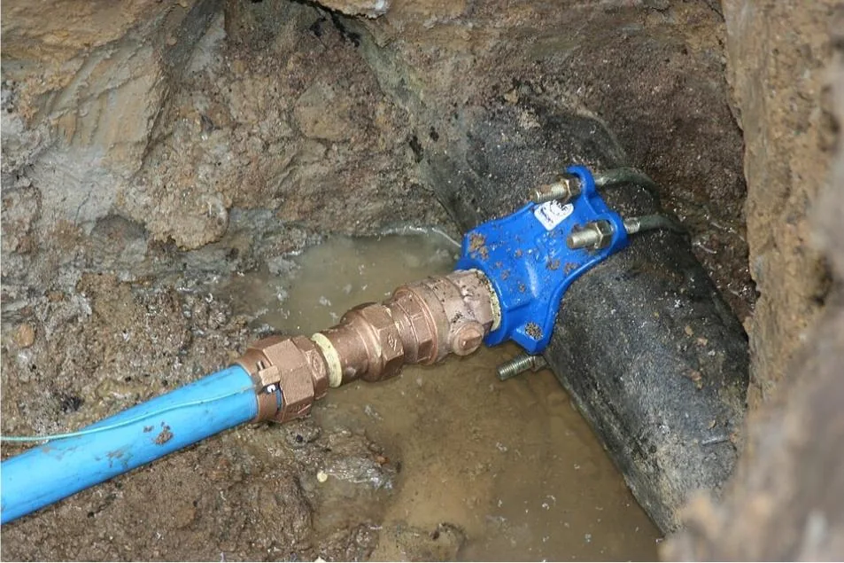 Underground water service line repair with new shutoff valve fitting